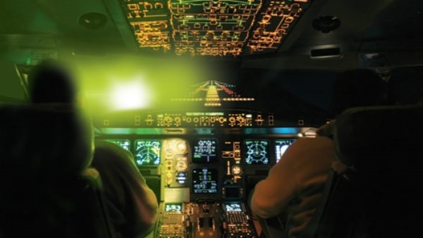 Aircraft cockpit with risk of laser strikes.