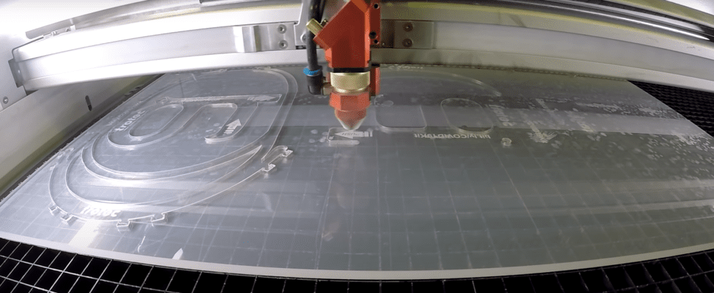 A close up of a laser cutting machine.