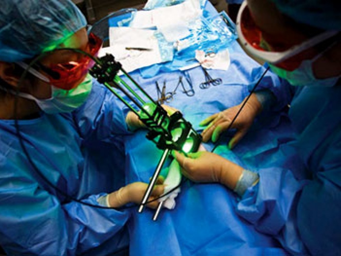A team of surgeons performing medical surgery.